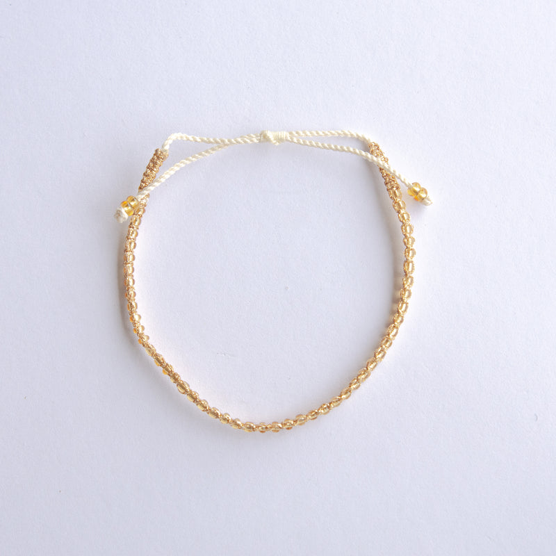 Add a pop of sparkle to your look with our Plating Bead Plain Anklets! These trendy anklets, made with seed beads and a touch of gold, are perfect for layering or wearing solo. Lightweight and durable, they’re an easy addition to your everyday style.