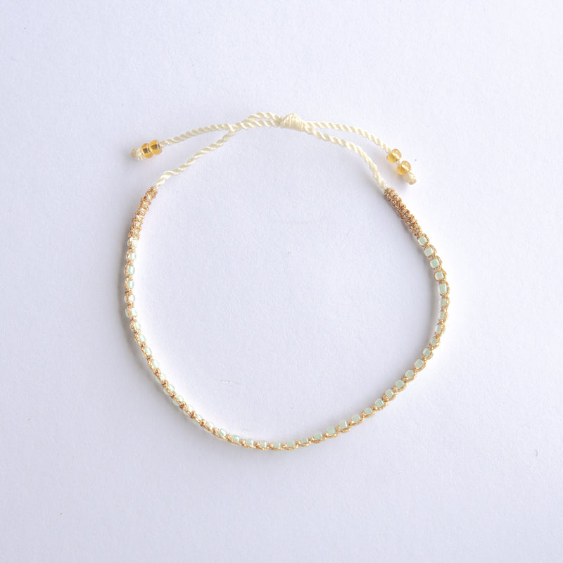 Add a pop of sparkle to your look with our Plating Bead Plain Anklets! These trendy anklets, made with seed beads and a touch of gold, are perfect for layering or wearing solo. Lightweight and durable, they’re an easy addition to your everyday style.