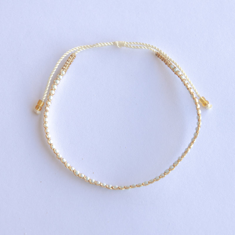 Add a pop of sparkle to your look with our Plating Bead Plain Anklets! These trendy anklets, made with seed beads and a touch of gold, are perfect for layering or wearing solo. Lightweight and durable, they’re an easy addition to your everyday style.