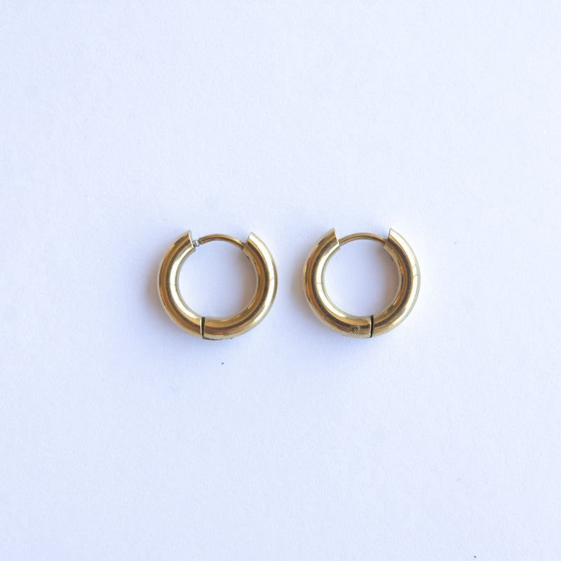 These Classic Hoops are available in both silver and gold and in a range of sizes and widths, so you can create your perfect earring combination. Don't forget to check our thinner version too.