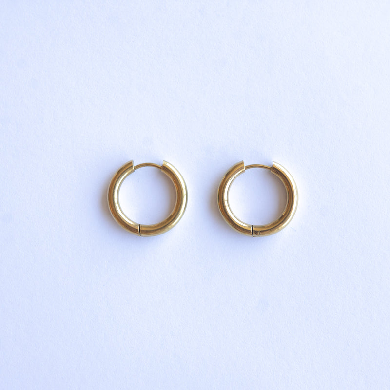 These Classic Hoops are available in both silver and gold and in a range of sizes and widths, so you can create your perfect earring combination. Don't forget to check our thinner version too.