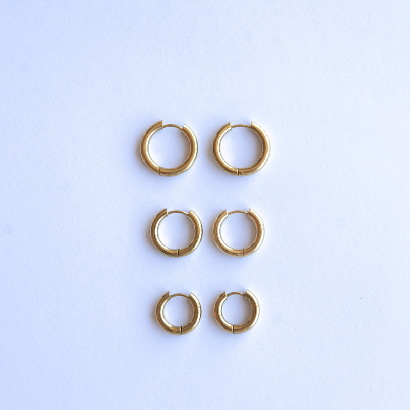 These Classic Hoops are available in both silver and gold and in a range of sizes and widths, so you can create your perfect earring combination. Don't forget to check our thinner version too.