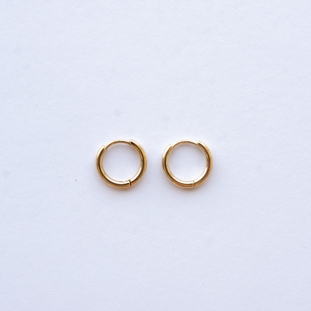 These Classic Hoops are available in both silver and gold and in a range of sizes and widths, so you can create your perfect earring combination. Don't forget to check our thicker version too.