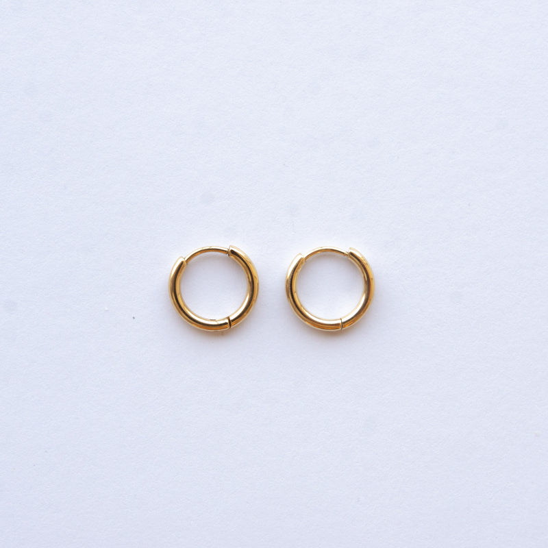 These Classic Hoops are available in both silver and gold and in a range of sizes and widths, so you can create your perfect earring combination. Don't forget to check our thicker version too.