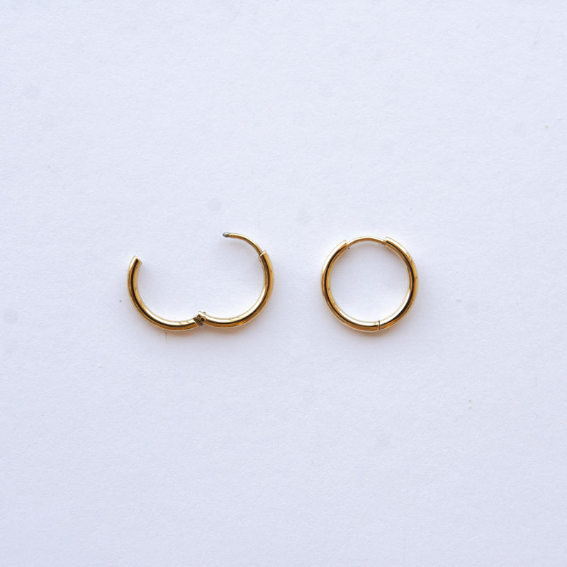 These Classic Hoops are available in both silver and gold and in a range of sizes and widths, so you can create your perfect earring combination. Don't forget to check our thicker version too.