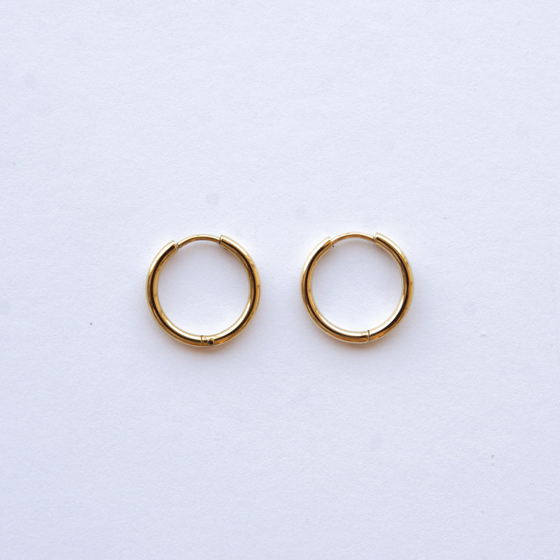 These Classic Hoops are available in both silver and gold and in a range of sizes and widths, so you can create your perfect earring combination. Don't forget to check our thicker version too.