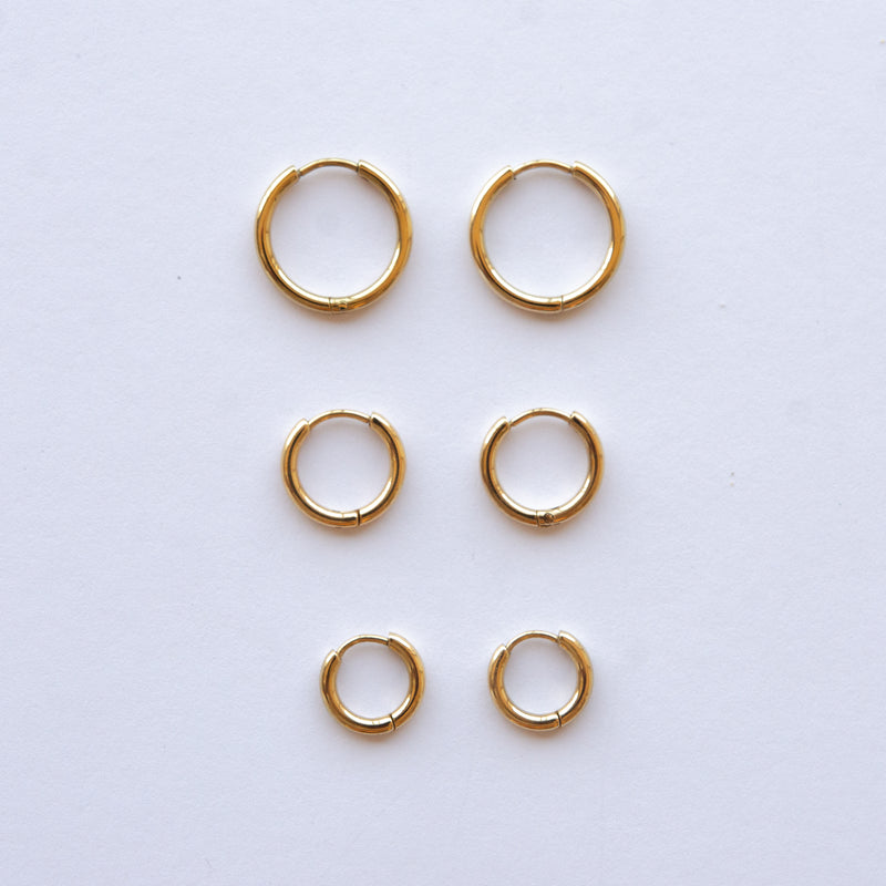 These Classic Hoops are available in both silver and gold and in a range of sizes and widths, so you can create your perfect earring combination. Don't forget to check our thicker version too.