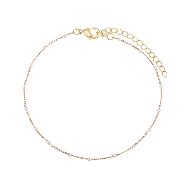 Check out our Petite Shimmer Imitation Pearls Anklet, perfect for adding a touch of glam to your look! Made with high-quality brass and either gold or silver plating, this anklet is durable and keeps its shine. The cute imitation pearls give it a stylish, timeless vibe, making it a must-have accessory for any outfit.