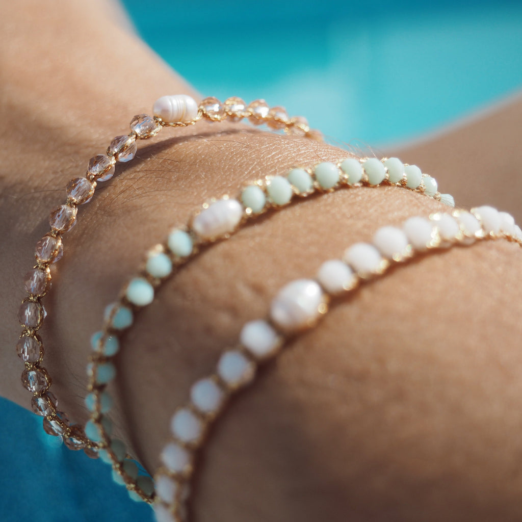 Add a splash of fun to your style with our Single Pearl Bliss Adjustable Bracelets! Available in vibrant colors and made with durable materials, these bracelets are perfect for everyday wear and mixing and matching with your favorite outfits. Available in 5 different colors.