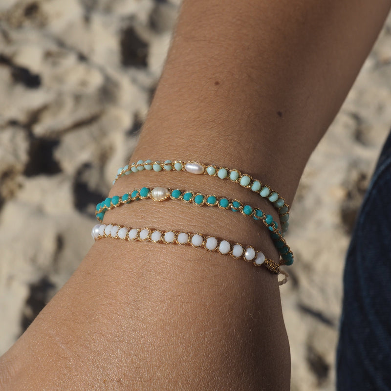 Add a splash of fun to your style with our Single Pearl Bliss Adjustable Bracelets! Available in vibrant colors and made with durable materials, these bracelets are perfect for everyday wear and mixing and matching with your favorite outfits. Available in 5 different colors.