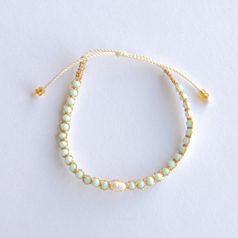 Add a splash of fun to your style with our Single Pearl Bliss Adjustable Bracelets! Available in vibrant colors and made with durable materials, these bracelets are perfect for everyday wear and mixing and matching with your favorite outfits. Available in 5 different colors.