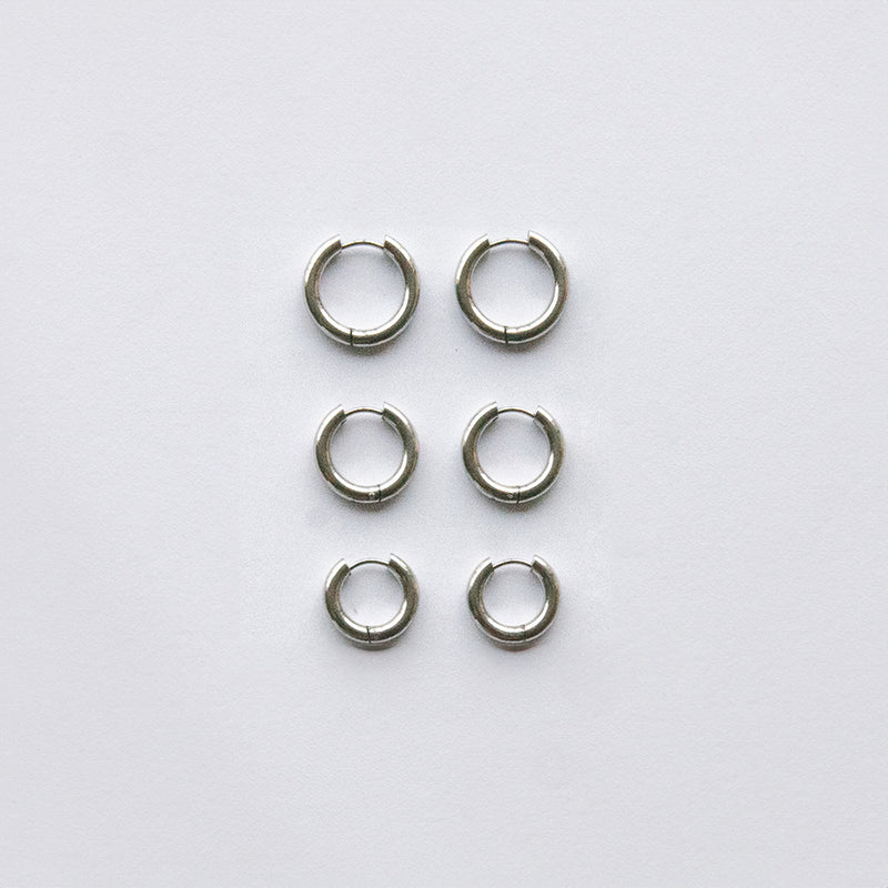 These Classic Hoops are available in both silver and gold and in a range of sizes and widths, so you can create your perfect earring combination. Don't forget to check our thinner version too.