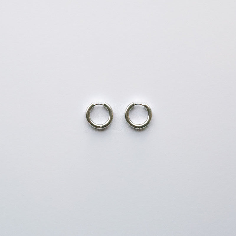 These Classic Hoops are available in both silver and gold and in a range of sizes and widths, so you can create your perfect earring combination. Don't forget to check our thinner version too.