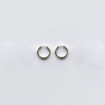 These Classic Hoops are available in both silver and gold and in a range of sizes and widths, so you can create your perfect earring combination. Don't forget to check our thinner version too.