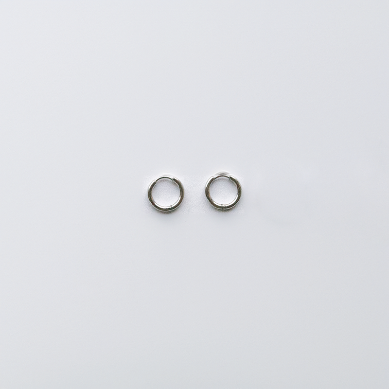 These Classic Hoops are available in both silver and gold and in a range of sizes and widths, so you can create your perfect earring combination. Don't forget to check our thicker version too.