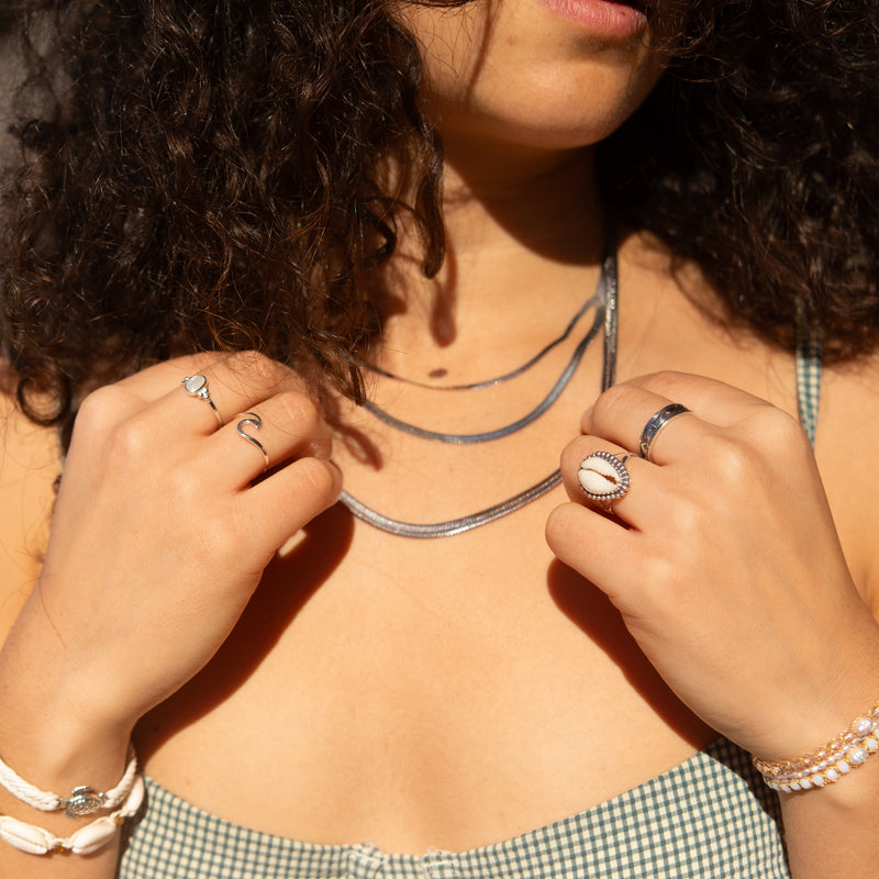 Explore timeless jewelry with our Stainless Steel Snake Chain Necklace. Crafted for durability and style, it's the perfect accessory for any occasion. Get yours today and elevate your look effortlessly. We also have the matchy bracelet and the same set in gold. Mix and match to get the best outfits!