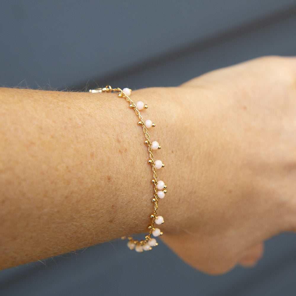 Gold bracelet with peach bohemian beads